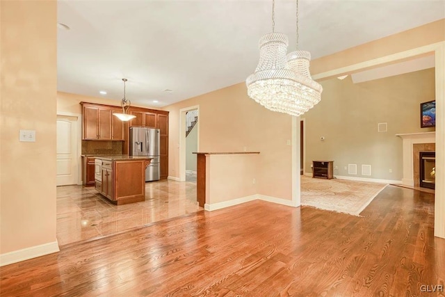 unfurnished living room featuring light hardwood / wood-style floors