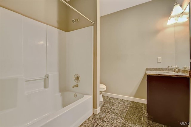 full bathroom with toilet, vanity, and shower / washtub combination