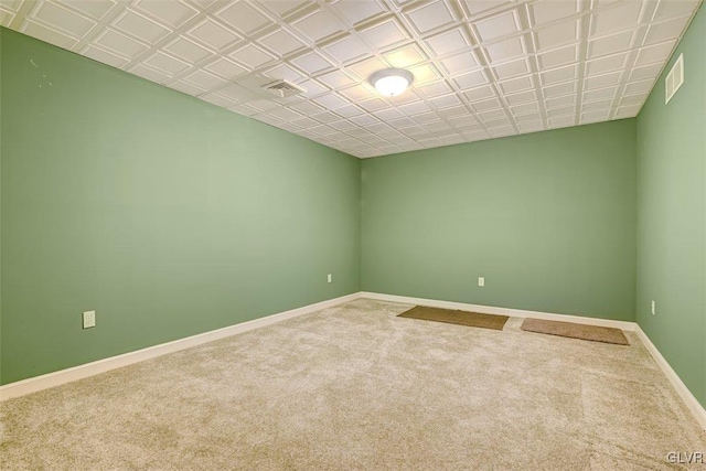 empty room featuring carpet flooring