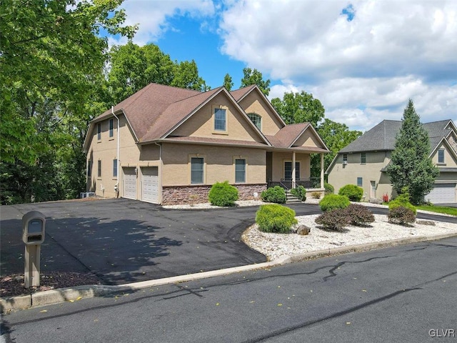 view of front of property with a garage