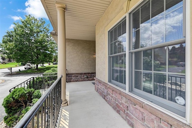 balcony featuring a porch