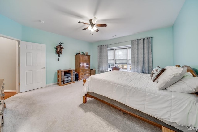 carpeted bedroom featuring ceiling fan