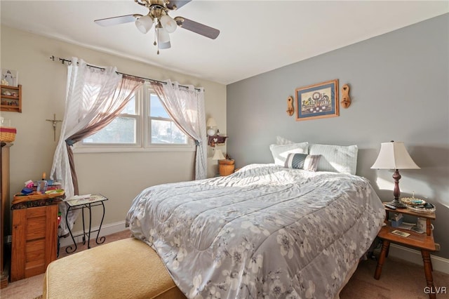 bedroom with carpet flooring, ceiling fan, and baseboards