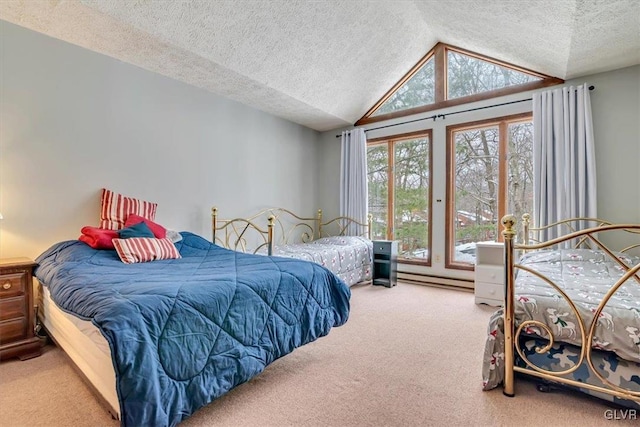 carpeted bedroom featuring a textured ceiling and lofted ceiling