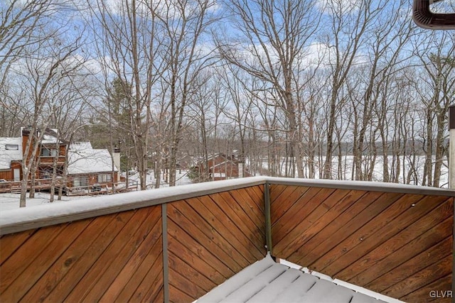 view of snow covered deck