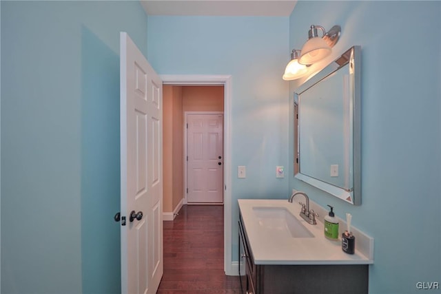 bathroom featuring wood-type flooring and vanity