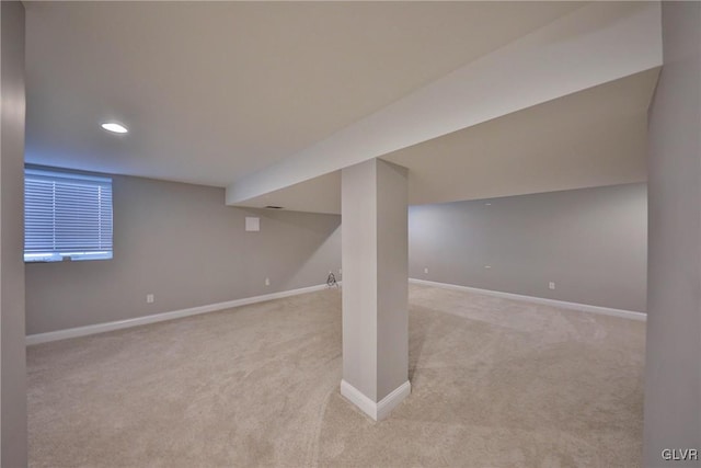 basement with light colored carpet