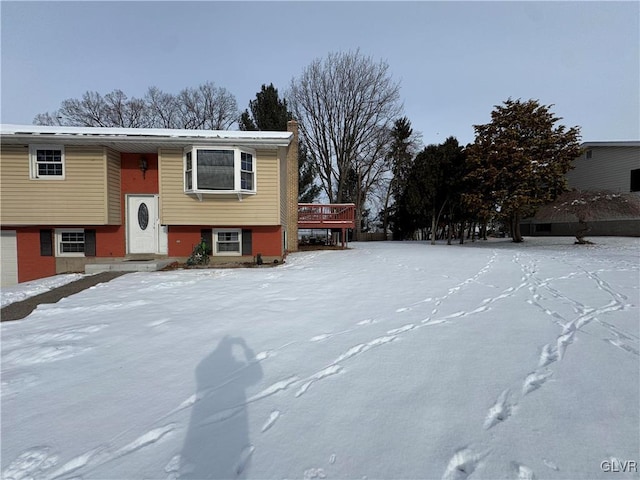 split foyer home with a deck