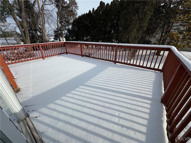 view of snow covered deck