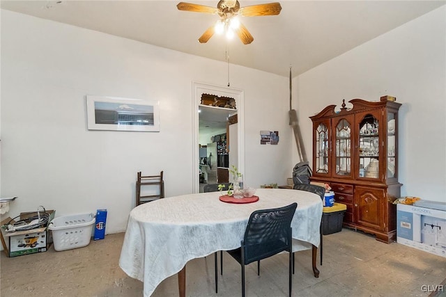 dining room featuring ceiling fan