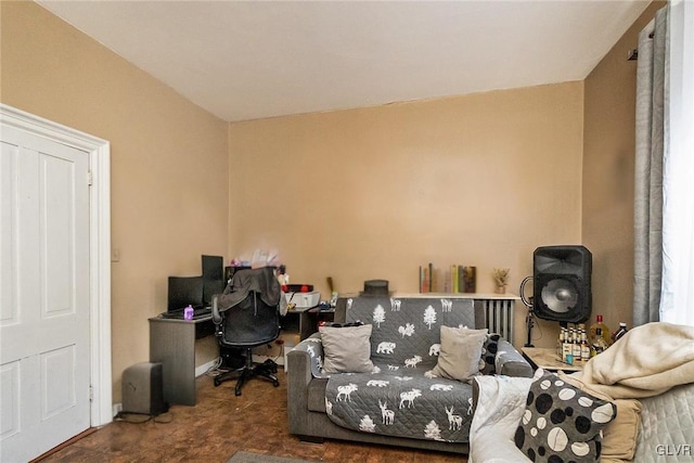 office area with dark colored carpet