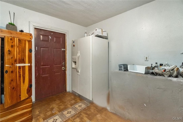 bathroom with a textured ceiling