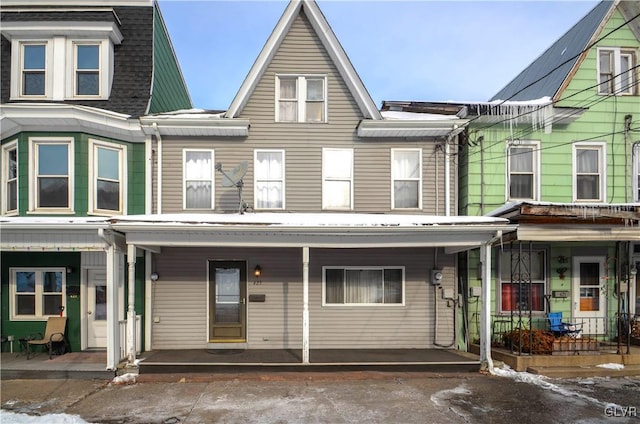 view of property featuring a porch