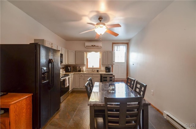 kitchen featuring black fridge with ice dispenser, a wall unit AC, a baseboard heating unit, sink, and electric range