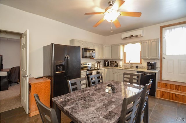 kitchen with black appliances, ceiling fan, sink, and a wall unit AC