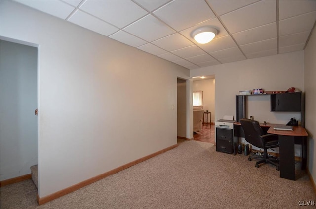 office with carpet flooring and a drop ceiling