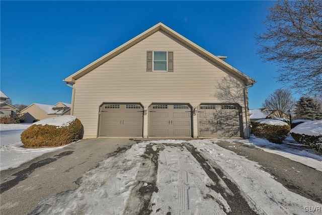 view of home's exterior featuring a garage