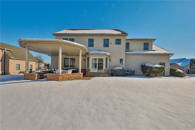 back of house featuring ceiling fan