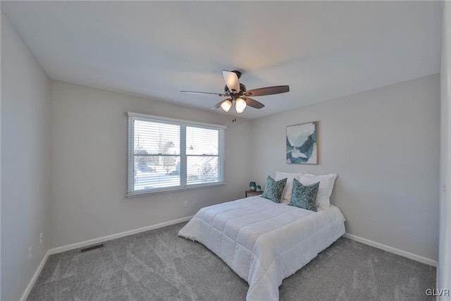 bedroom featuring ceiling fan and carpet floors