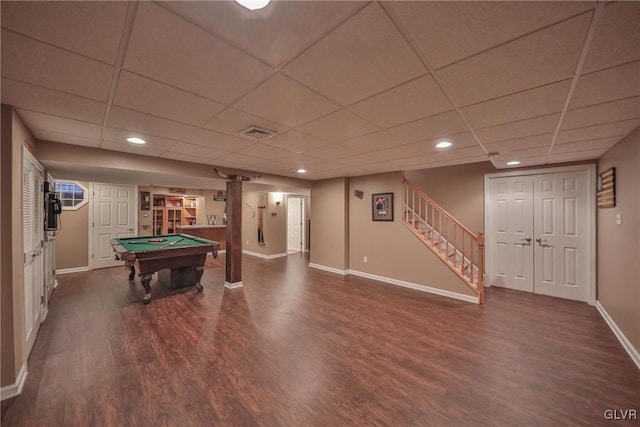 playroom featuring a paneled ceiling, dark wood-type flooring, and pool table