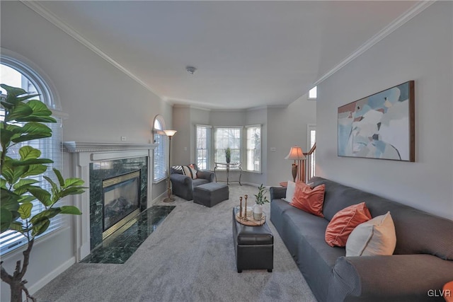 living room with carpet, ornamental molding, and a premium fireplace