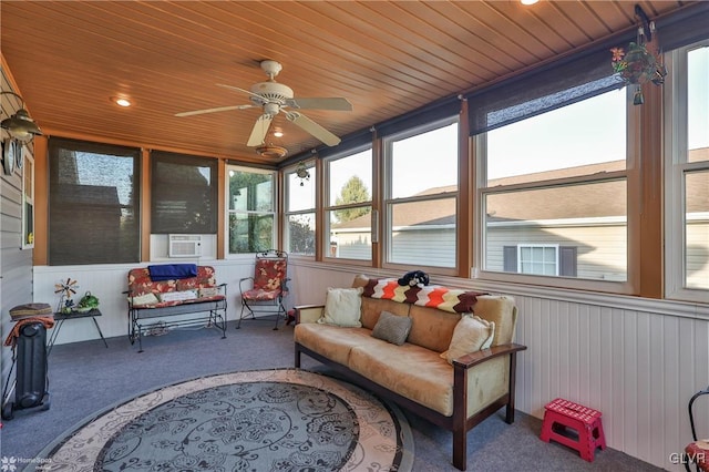 sunroom featuring cooling unit, ceiling fan, and wooden ceiling