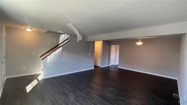 spare room featuring dark hardwood / wood-style flooring