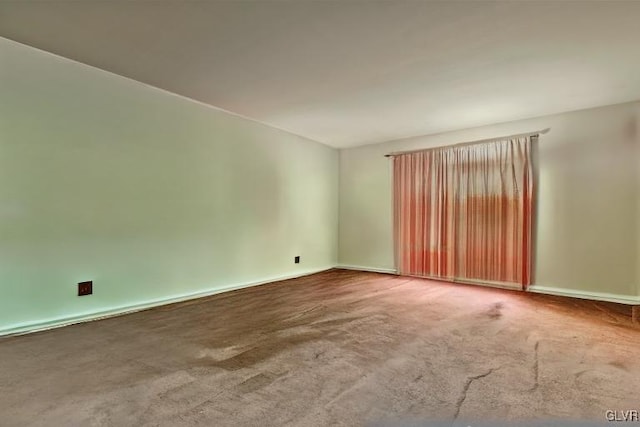 unfurnished room featuring carpet floors