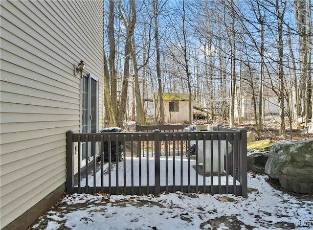 view of snow covered deck