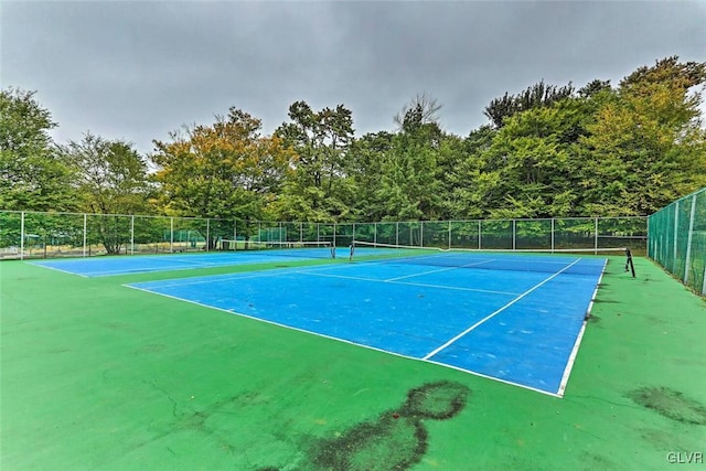 view of tennis court with basketball court