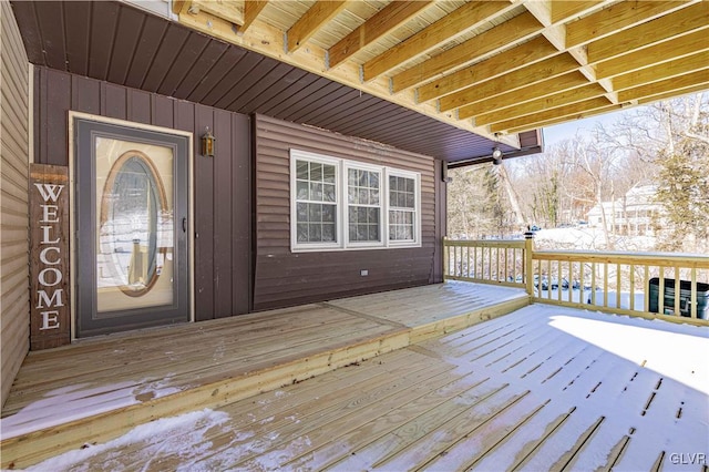 view of snow covered deck