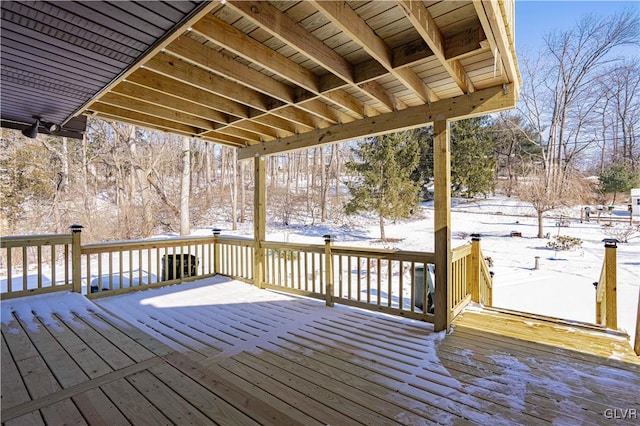 view of snow covered deck