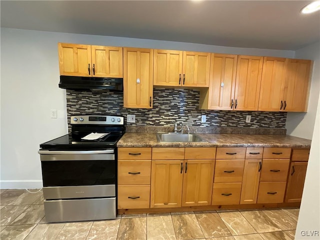 kitchen featuring tasteful backsplash, sink, and stainless steel electric range