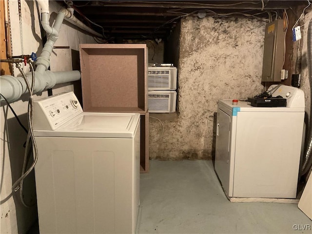 laundry room featuring washer and clothes dryer and electric panel