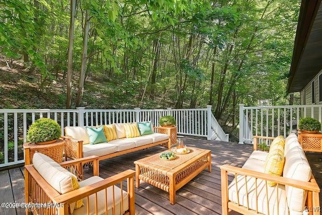 wooden deck featuring an outdoor hangout area