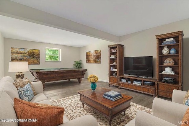 living room with beamed ceiling, billiards, and hardwood / wood-style floors