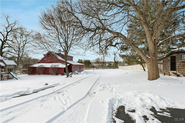 view of yard layered in snow