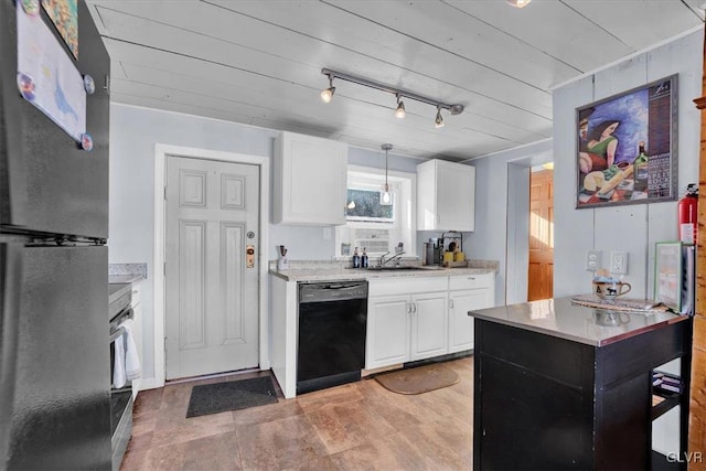 kitchen with sink, dishwasher, white cabinetry, hanging light fixtures, and fridge