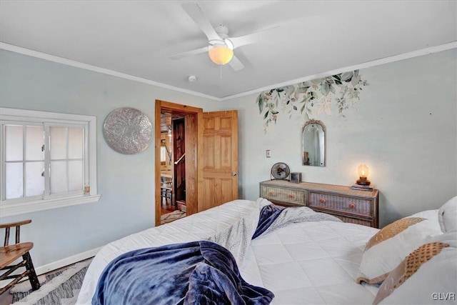 bedroom with crown molding and ceiling fan