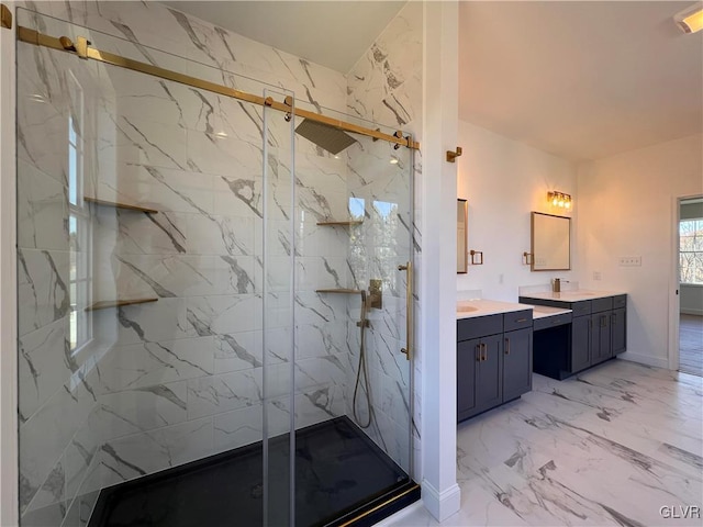 bathroom featuring vanity and a shower with shower door