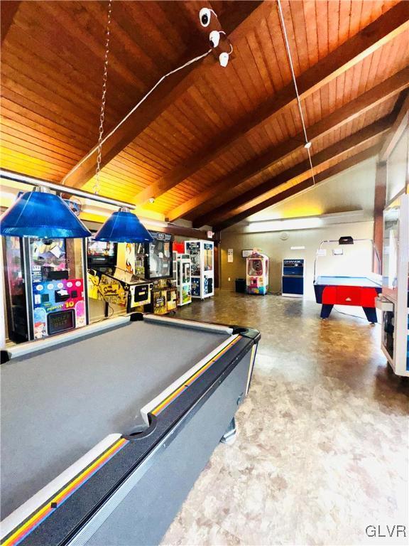 recreation room featuring pool table and lofted ceiling with beams