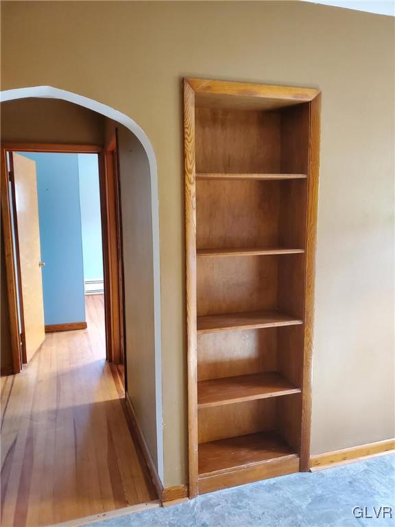 closet featuring a baseboard radiator