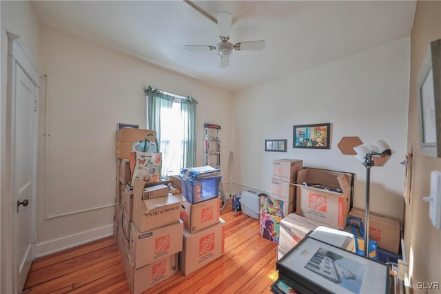 storage featuring a ceiling fan