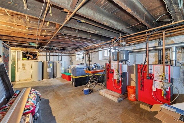 basement featuring water heater and electric water heater