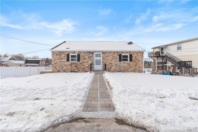 view of snow covered house