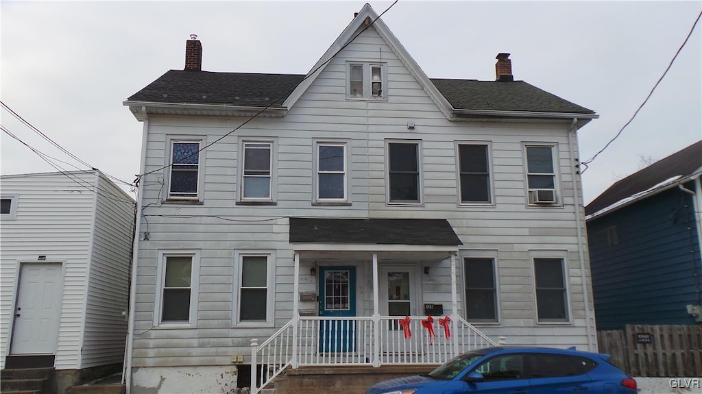 view of front of property featuring cooling unit