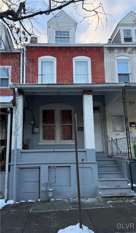 multi unit property featuring covered porch