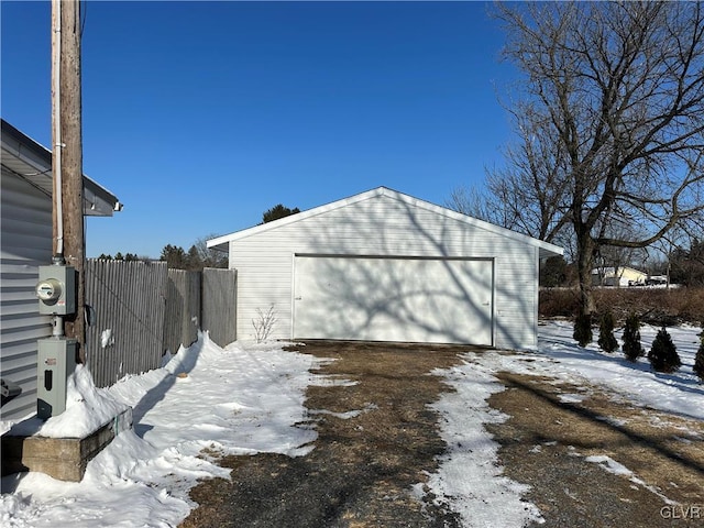 view of snow covered garage