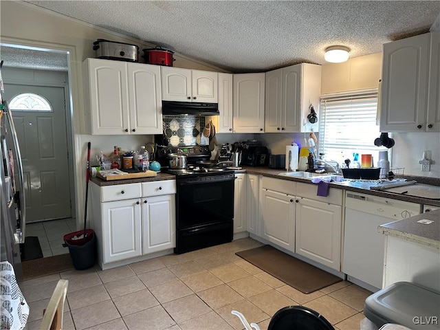 kitchen featuring sink, black range with electric stovetop, white dishwasher, white cabinets, and light tile patterned flooring