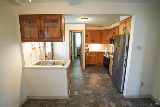 kitchen featuring appliances with stainless steel finishes and sink